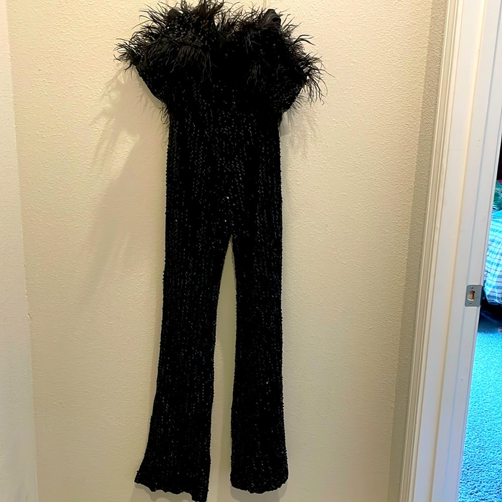 Miss ORD women’s black off-shoulder S sequins & faux feathers jumpsuit. NWOT.